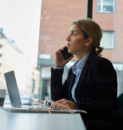 woman on the phone providing 24/7 support